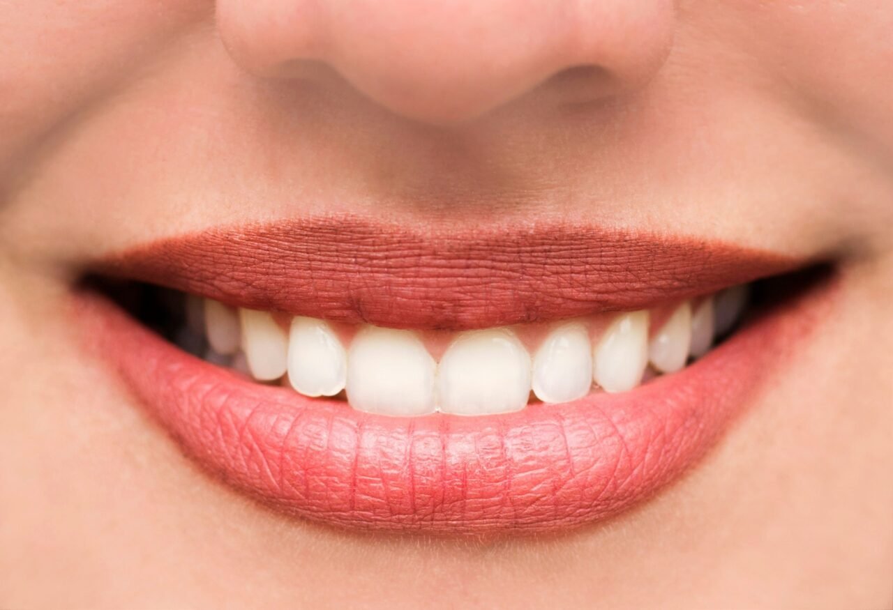 woman s lips and teeth smile close up.jpg